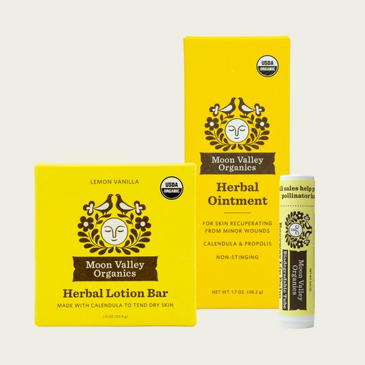 Moon Valley Organics Natural Body Collection Herbal Ointment with Lip Balm and Lotion Bar Front Boxes